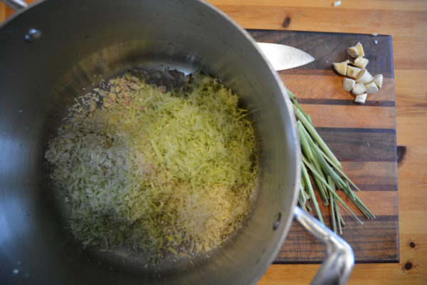 Shred chopped portions of lemongrass in blender, a small batch at a time.