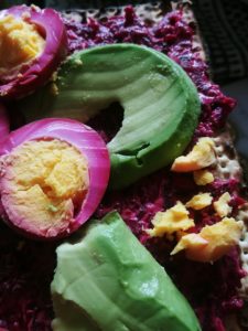 beet salad with pickled eggs and avocado